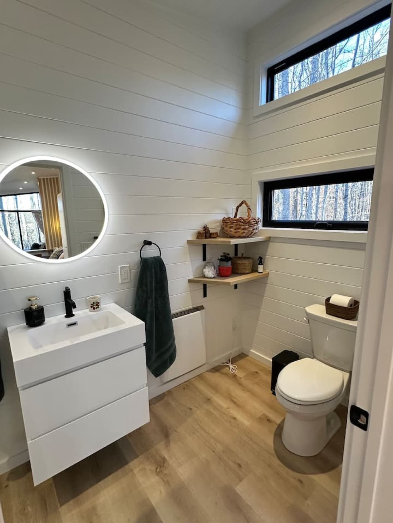 Refresh and recharge in this spa-like bathroom, complete with a tiled shower and stylish modern fixtures.