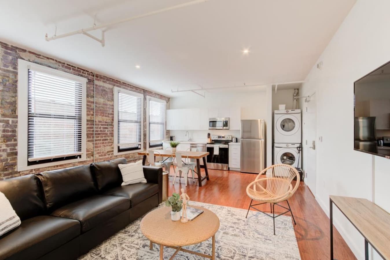 If you're staying a little longer or traveling a lot and need some fresh laundry, you will have a full-size washer and dryer inside the apartment. 

And an ideal size refrigerator for storing cold beverages and takeout or leftover food.