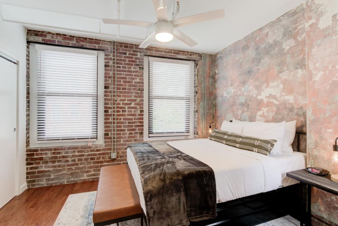 Nice and cozy bedroom with bedside tables that are handy for knick-knacks Place all your notes and other accessories within reach.  Also with bed bench for lounging while you wear or remove your footwear.