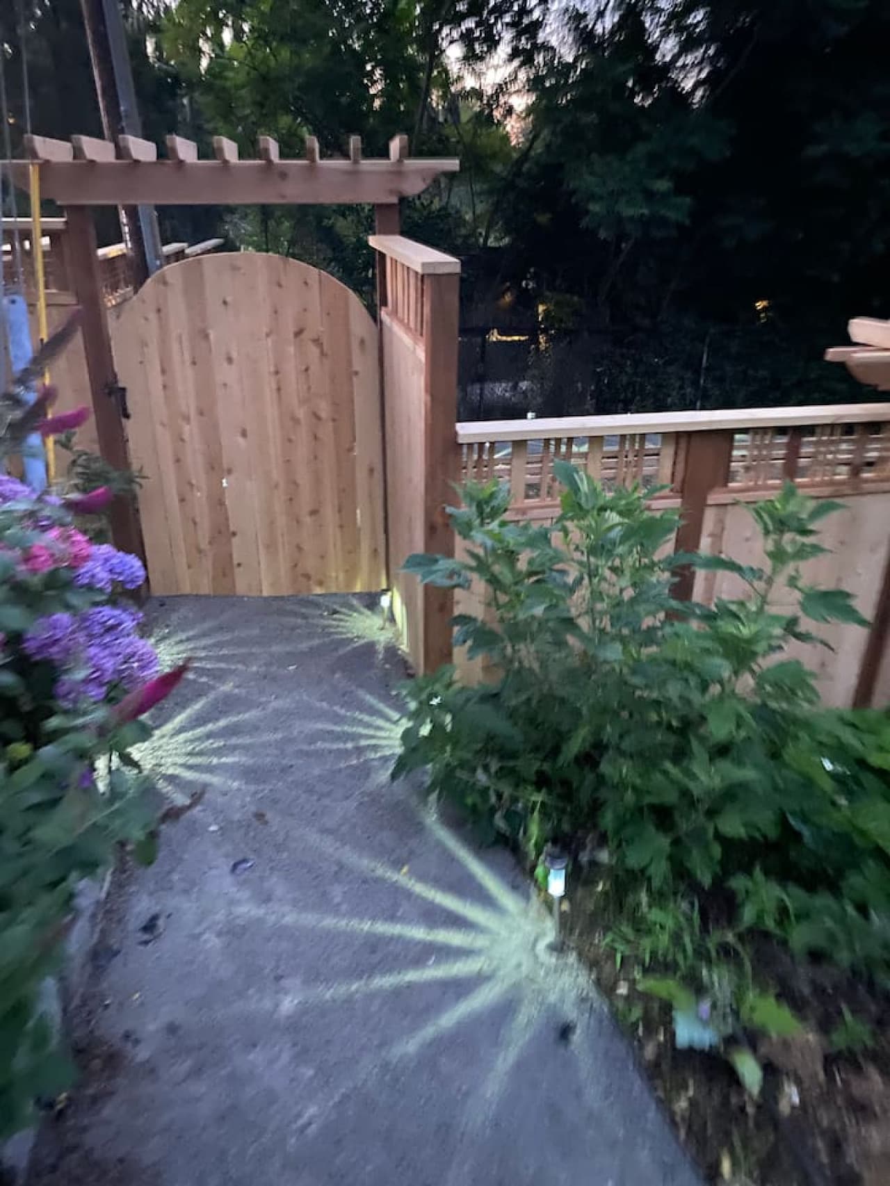 Your private fenced in and well lit entrance.