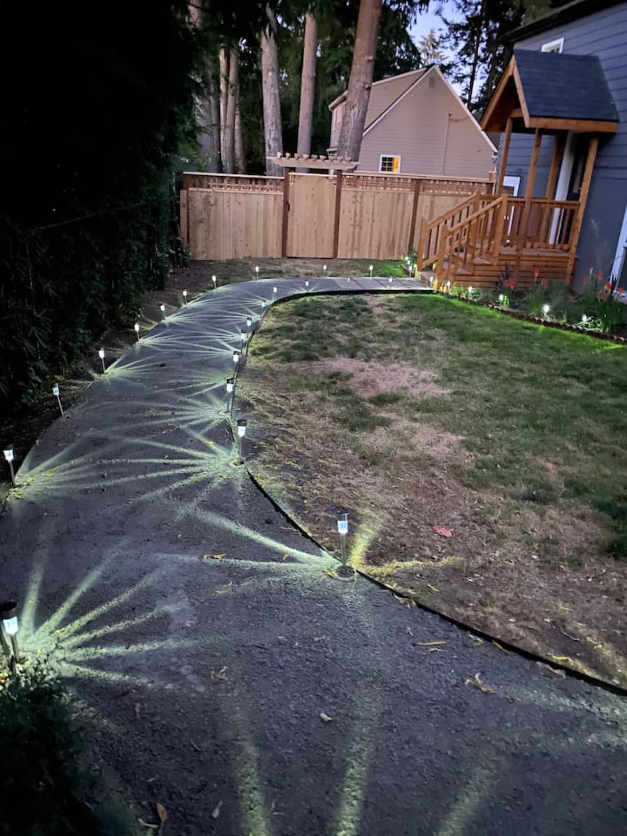 Fenced in, solar lit private backyard area.