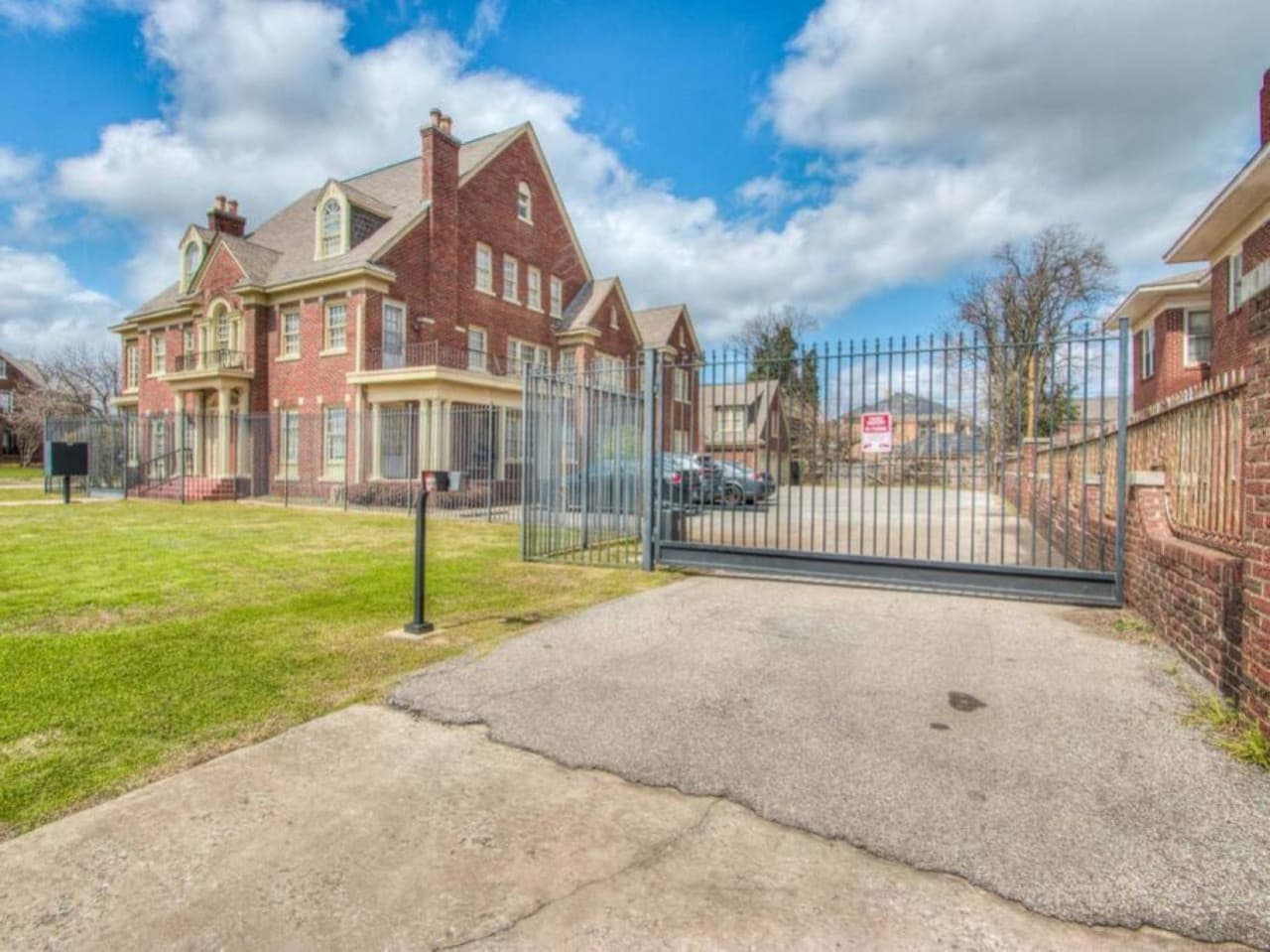 Here is a shot of the entrance, you have a private parking spot inside right in front of the second building where your apartment is located

*Please note your apartment is in the historic brick building behind this large main front building*