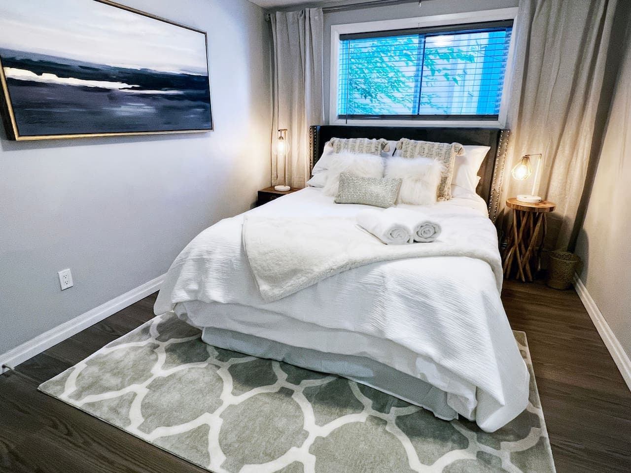 A peaceful retreat to recharge with soft linens, cozy vibes, and the promise of a good night’s sleep.