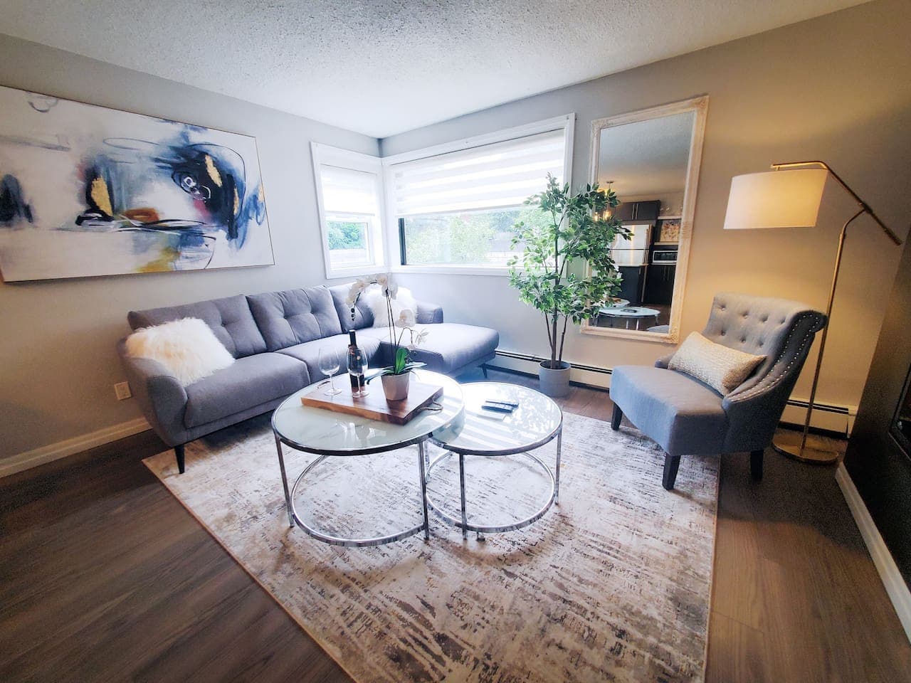 Sink into comfort. 
This stylish living space is perfect for unwinding with a book to read or watching a few shows on the TV.