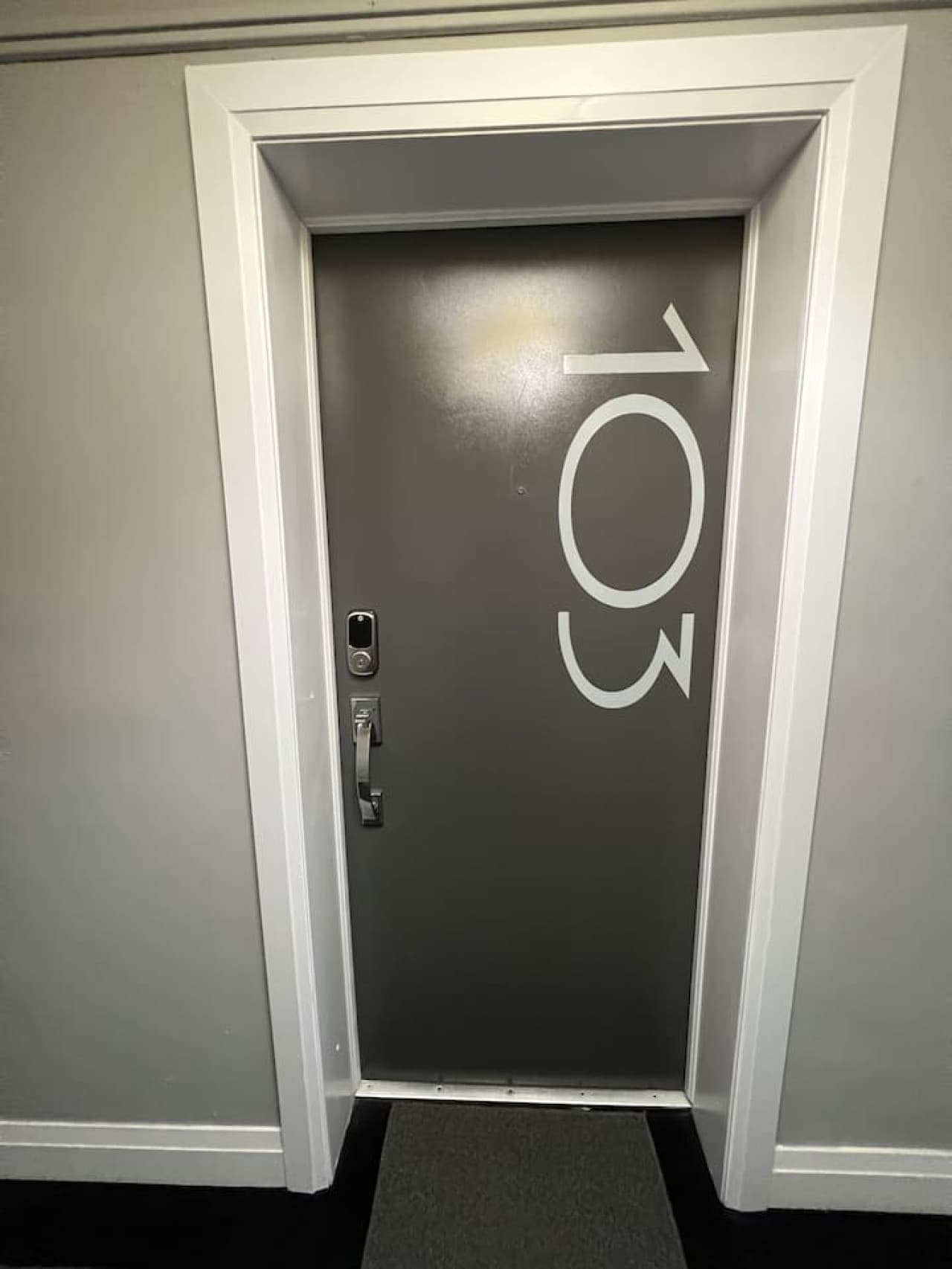 The suite's entrance is welcoming and easy to access, offering a private and comfortable entry to your stay.