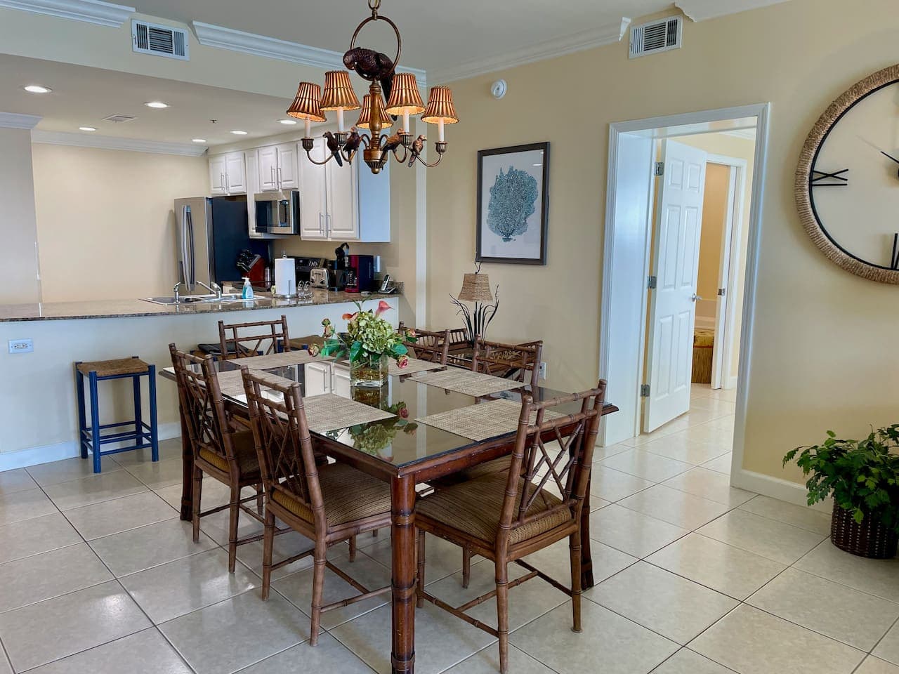 Gather around the table for meals, games, or planning tomorrow’s beach day.