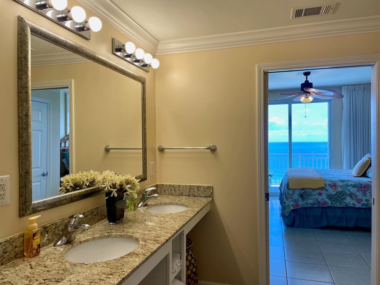 Bright, comfortable bathroom with tub, shower, and plenty of space for everyone to get ready.