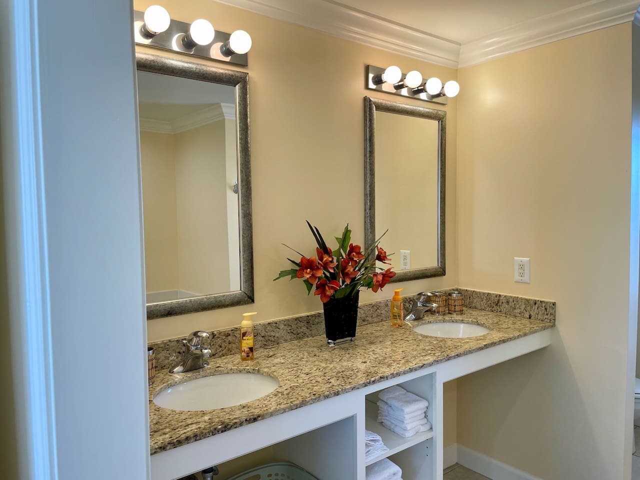 Double sinks, fresh towels, and a calm space to reset after the beach.