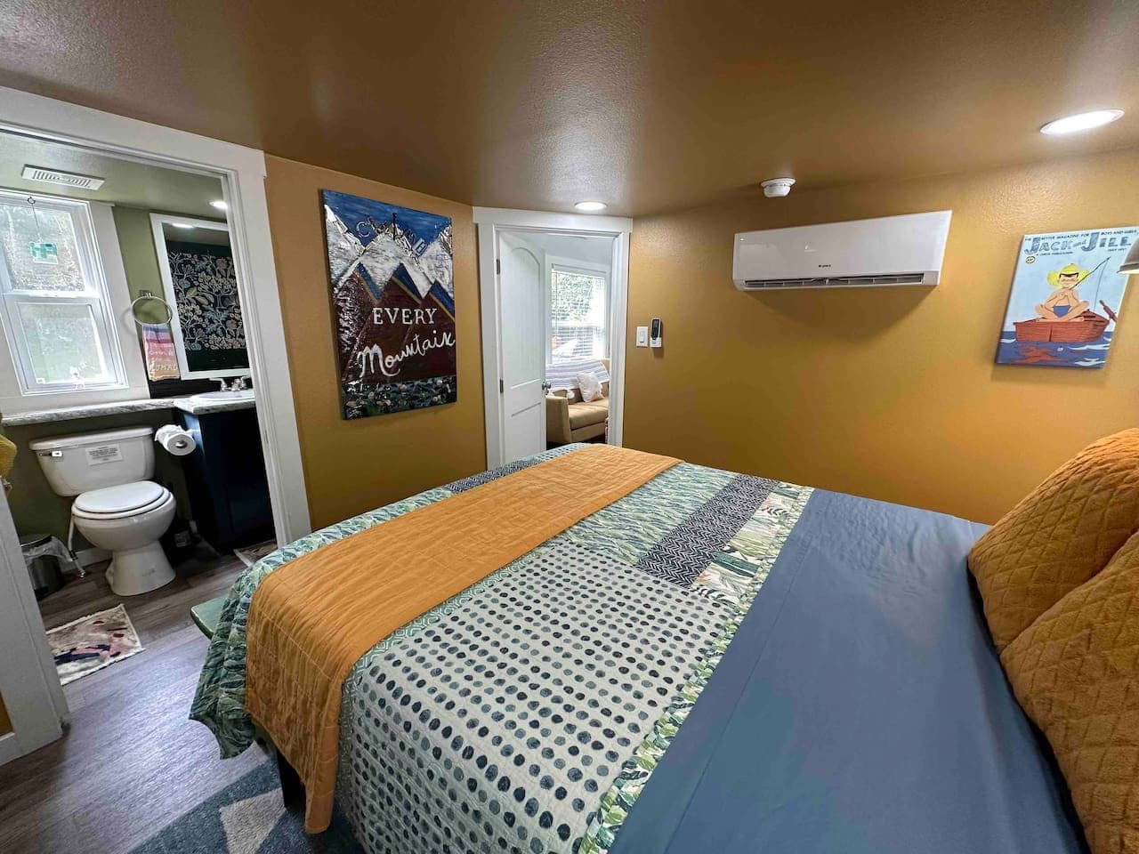 The master bedroom includes a private access door to the bathroom and a mini-split system for heating and air conditioning.