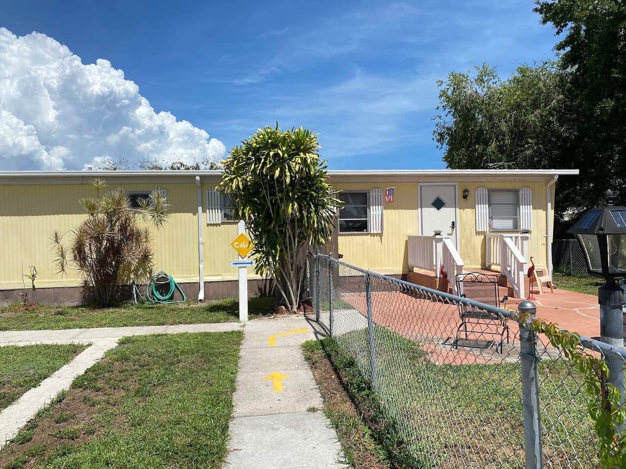 The front yard is fenced off and a great place for kids to play with there 4 legged companion.