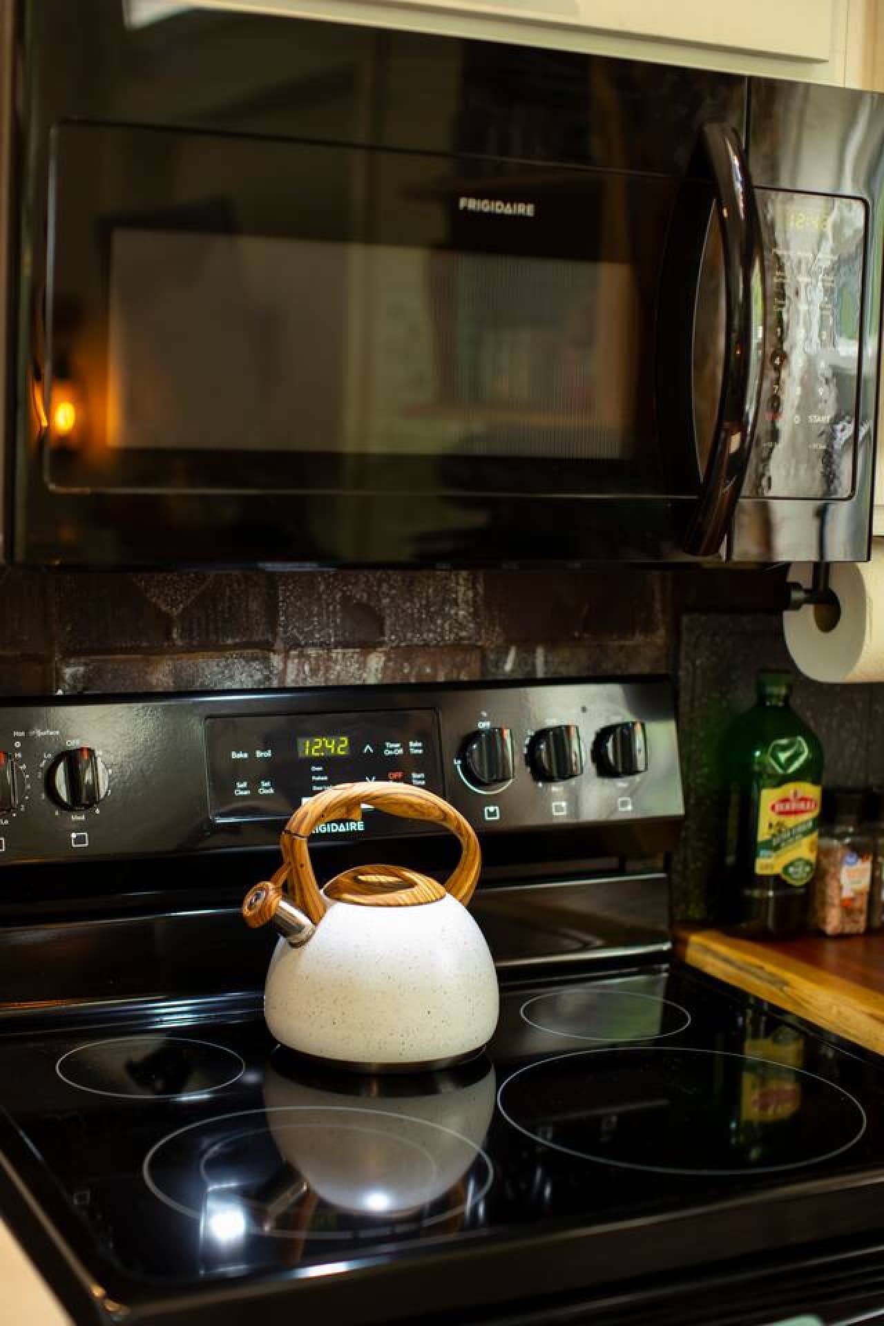 The stove and microwave offer everything you need to cook and reheat meals with ease during your stay.