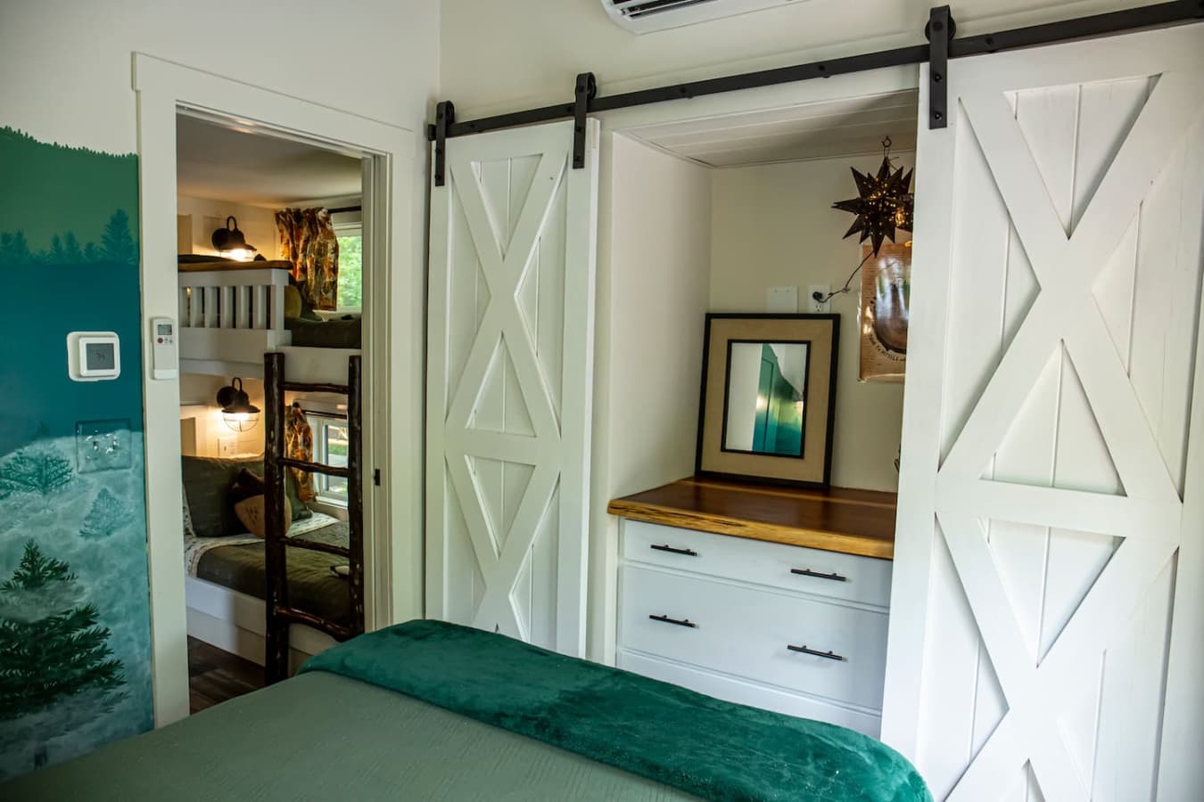 A convenient dresser provides plenty of drawer space for storing clothes and personal items.