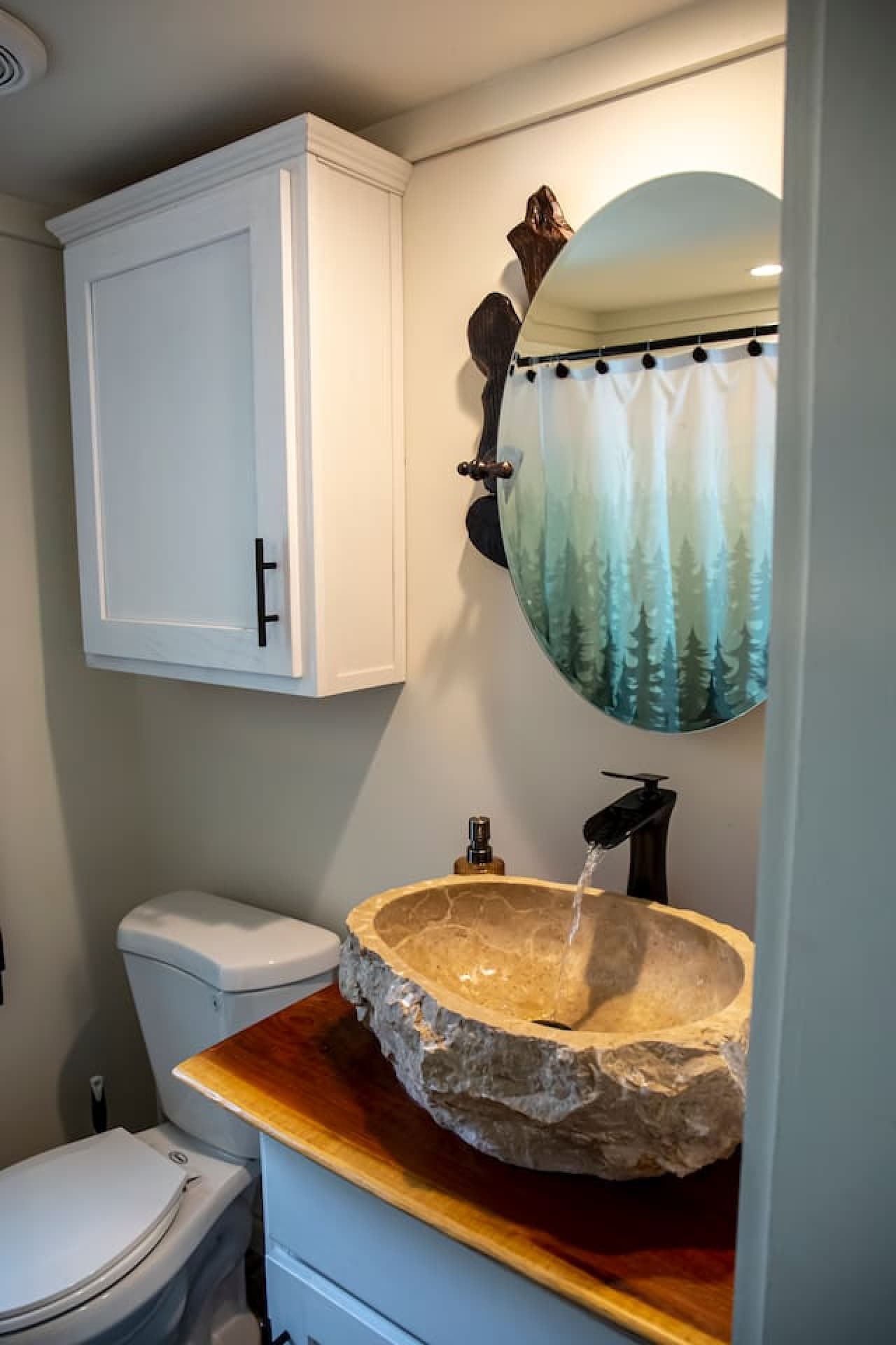 The vanity sink—perfect for morning prep, evening wind-downs, or just practicing your “I woke up in the mountains” smile.