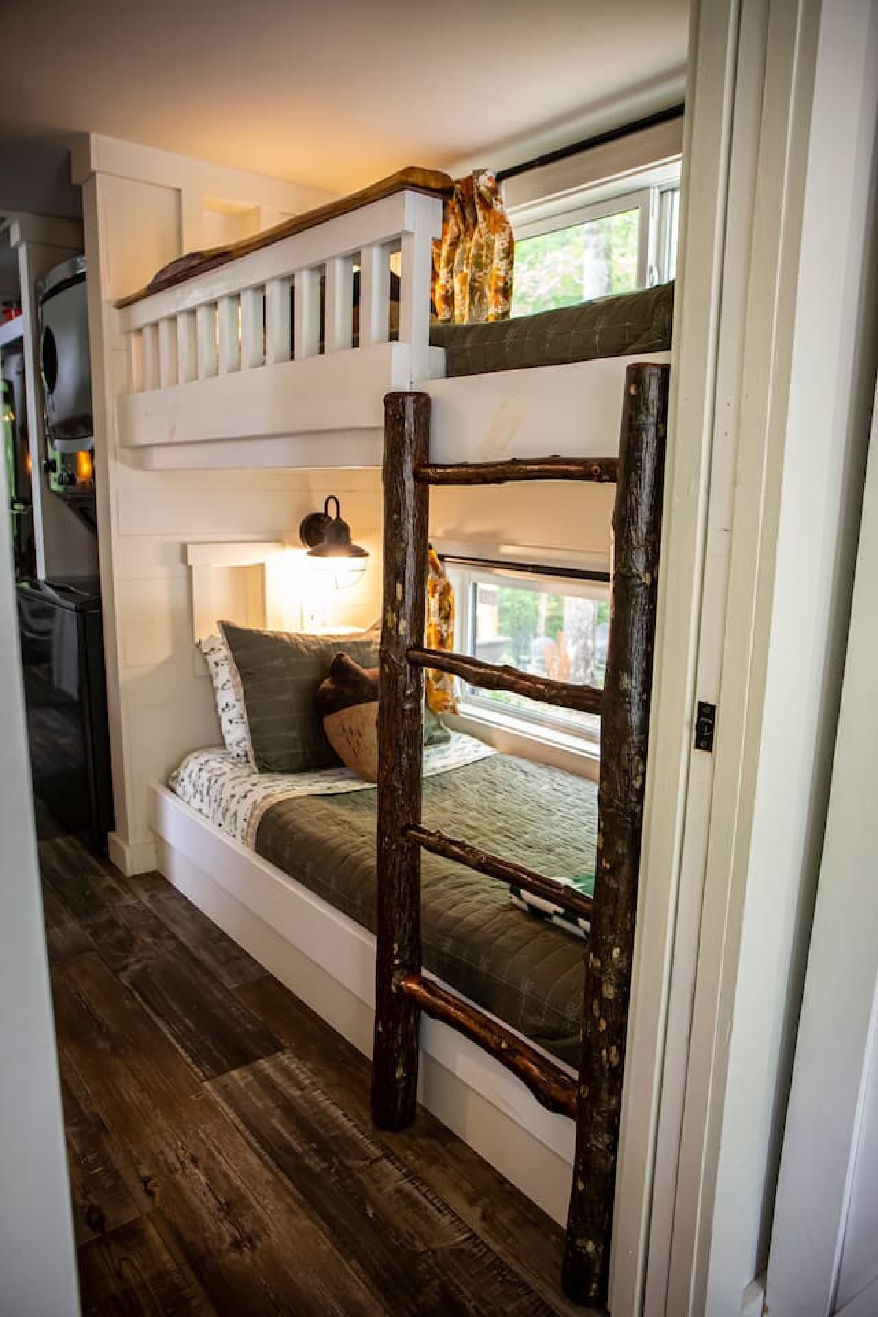 Twin-size bunk beds in the hall offer a cozy and fun sleeping space for additional guests.