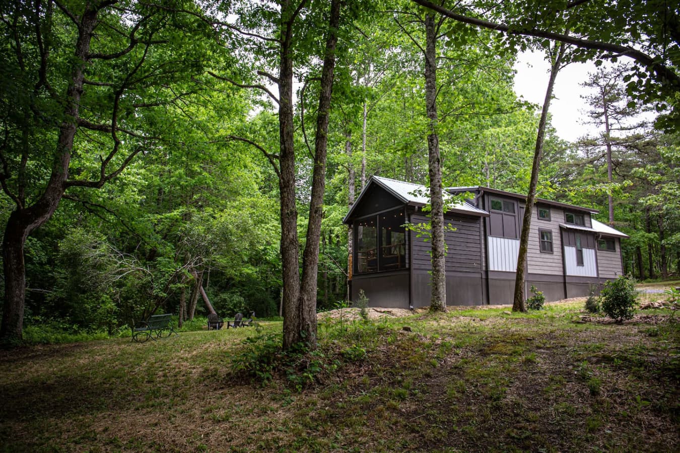 The Crooked Tree Cabin faces the woods and creek. Enjoy a cabin nestled in the woods on Blueberry Falls Farm.