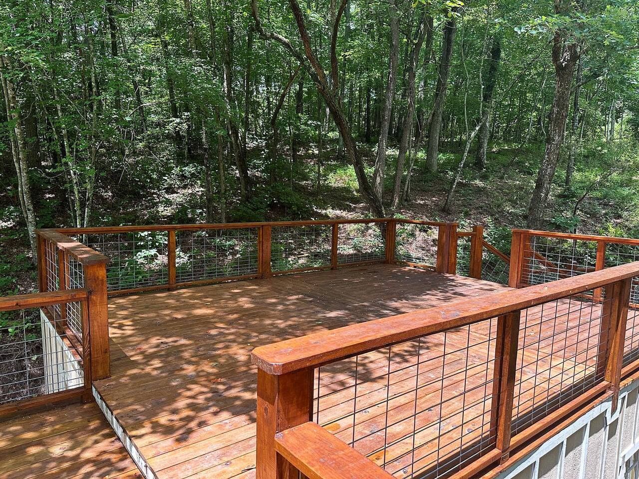 Enjoy panoramic views of the waterfall, pond, and forest from these scenic gathering spots—great for photos, sunrise coffee, or stargazing at night.