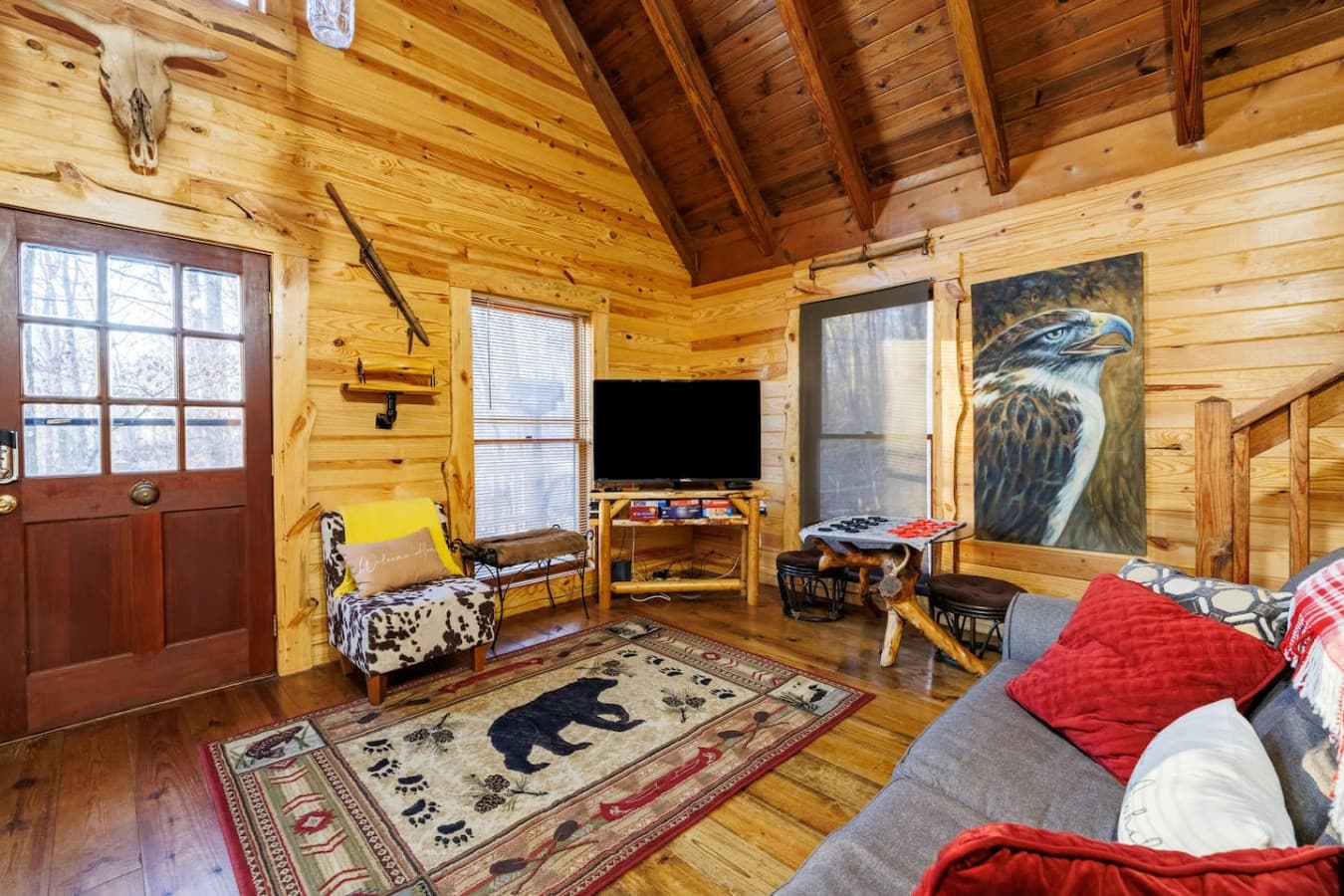 Living room with Smart TV and comfortable sofas.