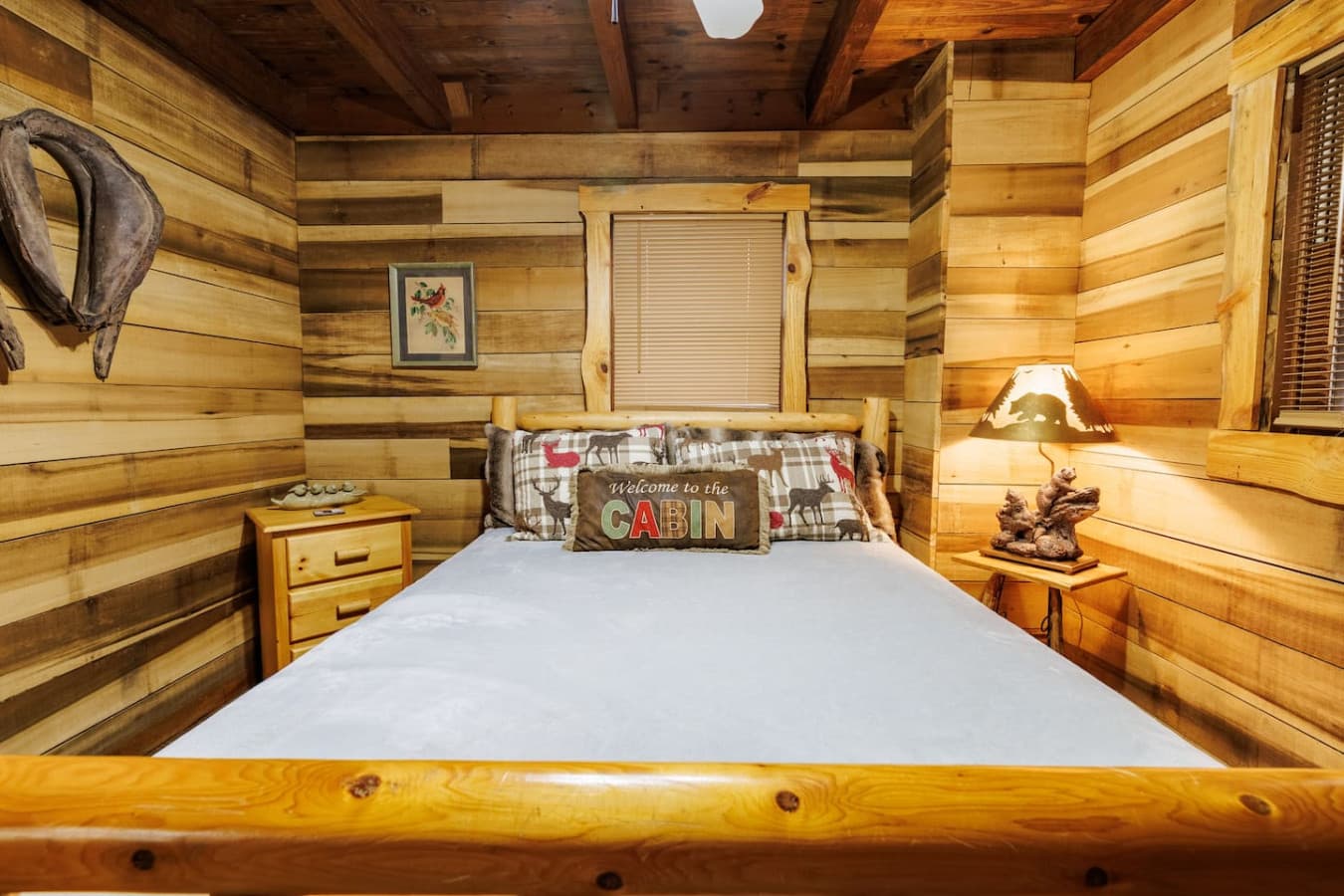 Ceiling fan and natural textures create a peaceful sleep retreat.