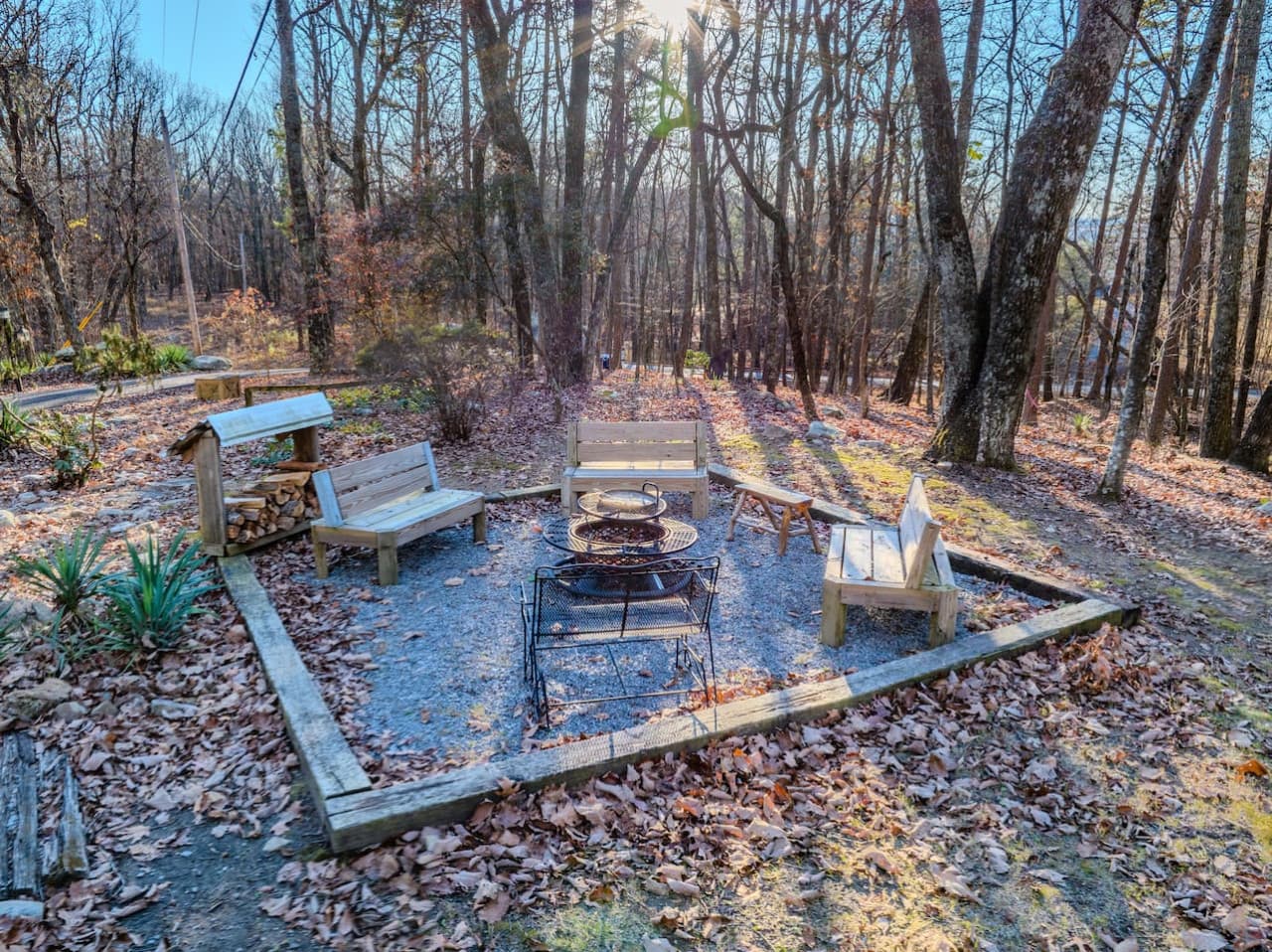 Rock Haven – Spacious outdoor fire pit area—perfect for cozy nights and family fun.