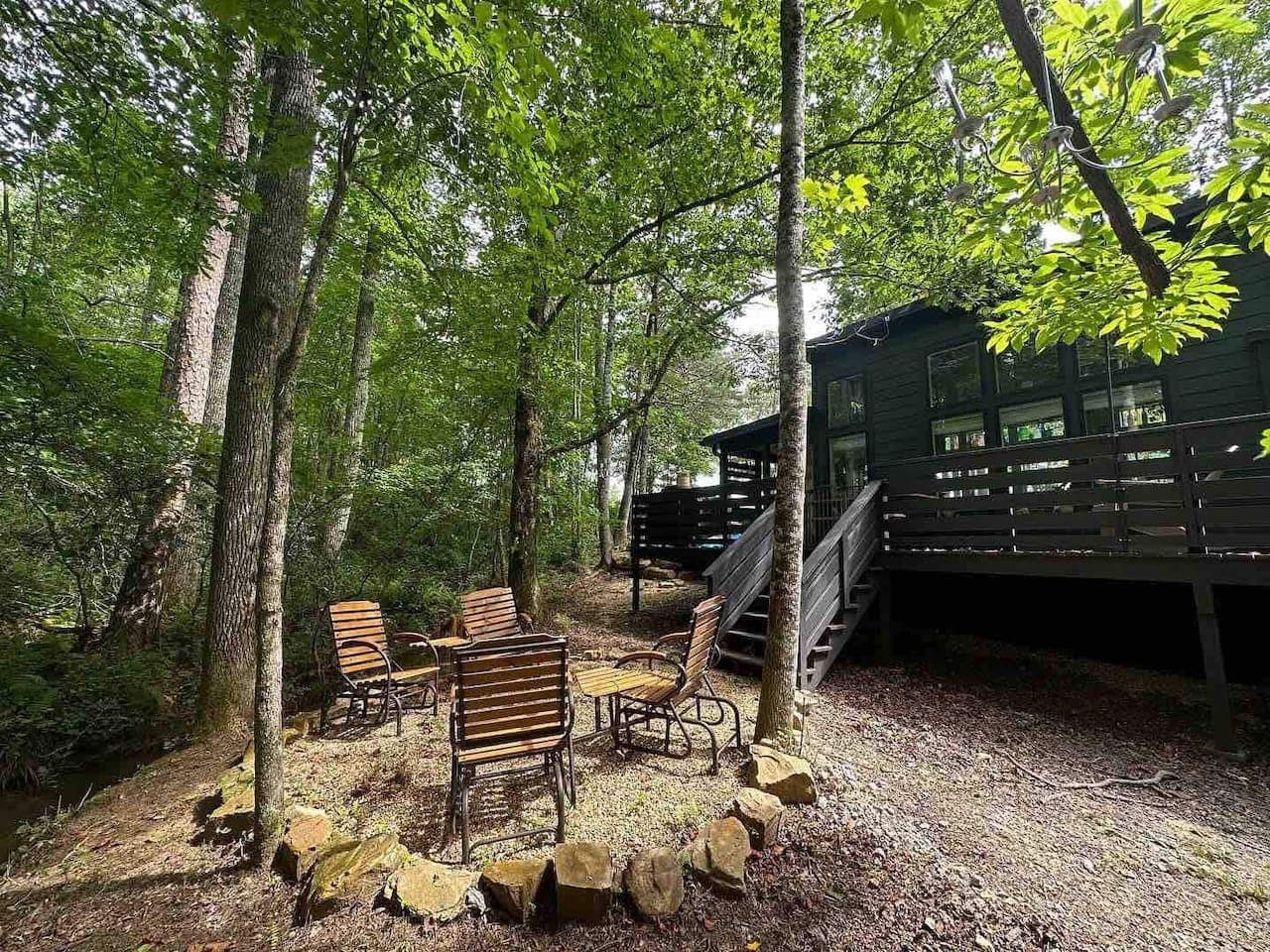 Kick back in the outdoor chairs by the creek—perfect for sipping coffee, stargazing, or debating who’s in charge of roasting the next marshmallow.