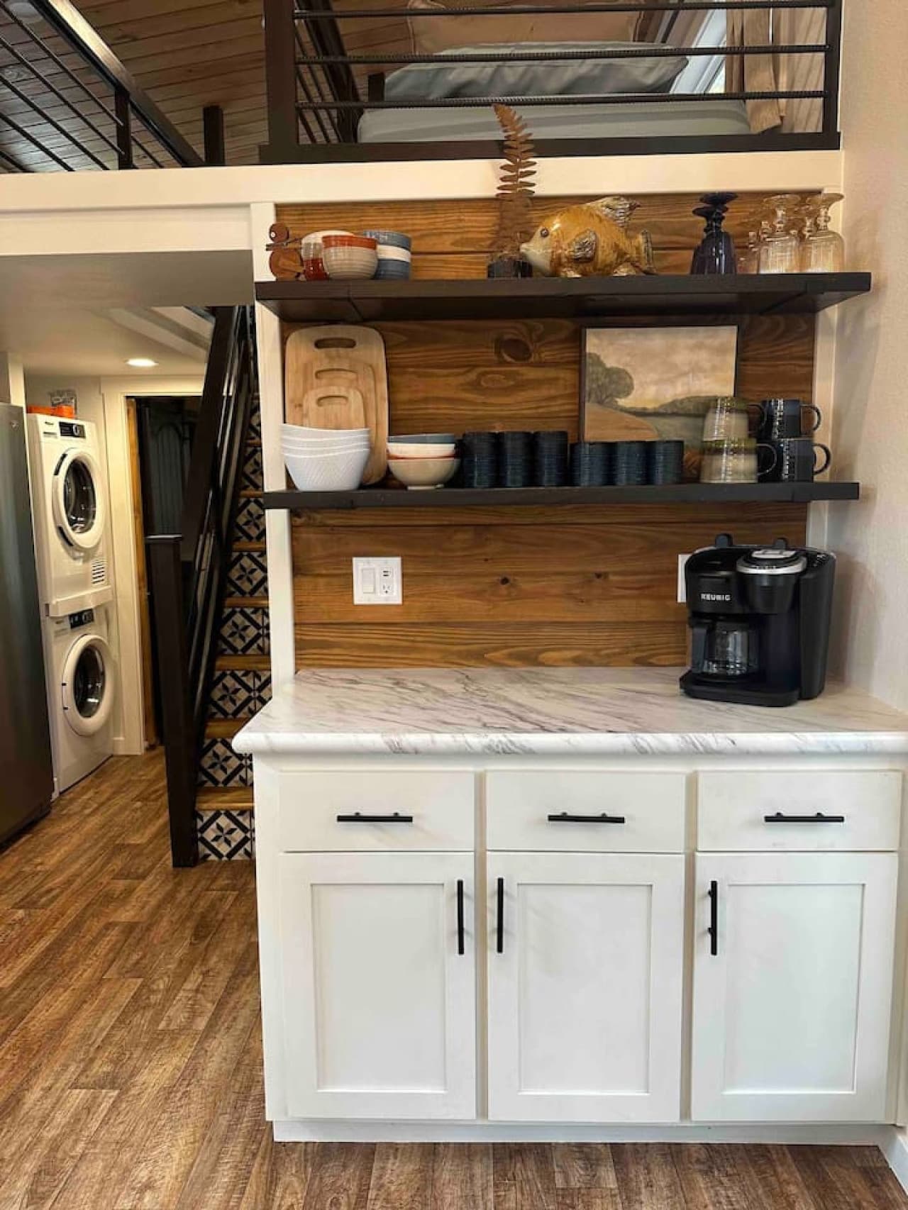 The coffee bar is stocked and ready with both Keurig and drip options—perfect for your morning brew or an afternoon pick-me-up.