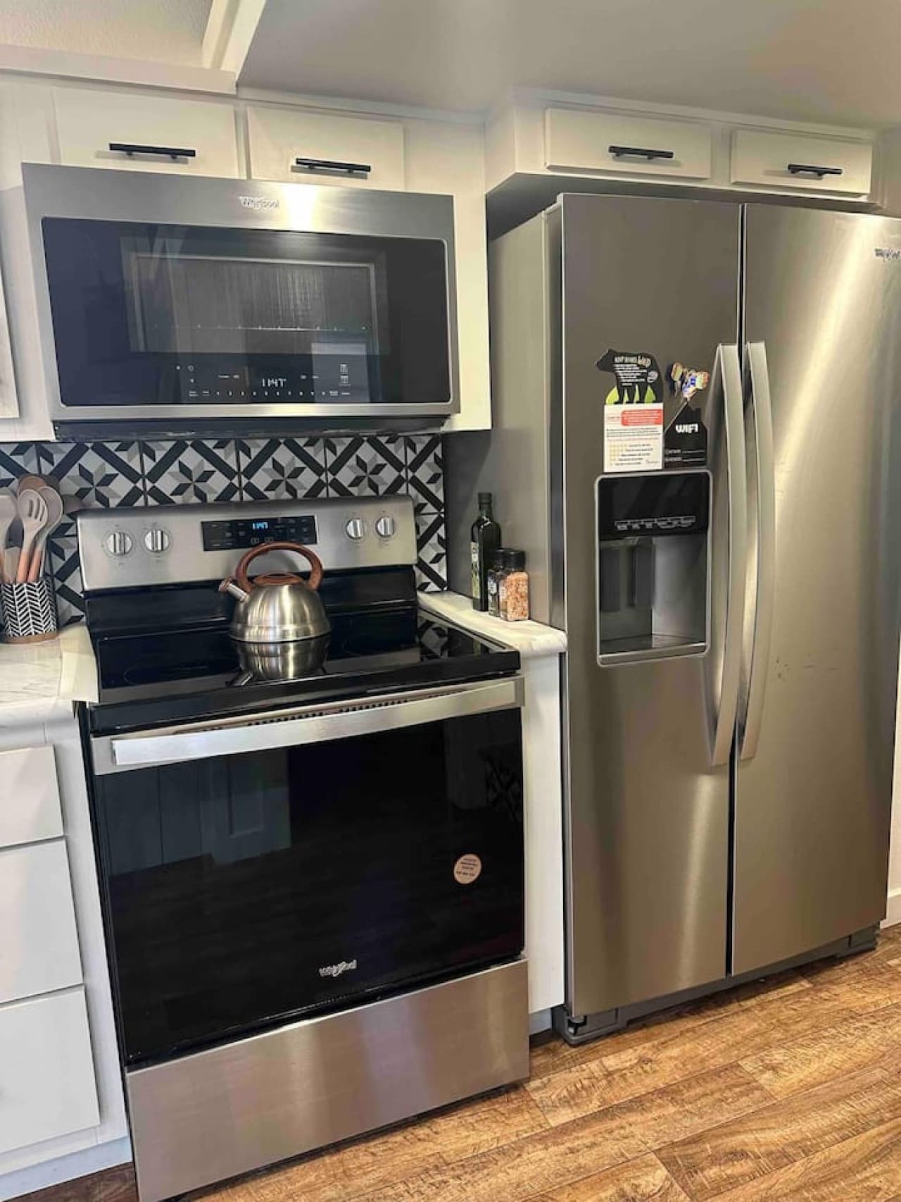 The kitchen includes a range, microwave, and refrigerator—everything you need for easy meal prep during your stay.