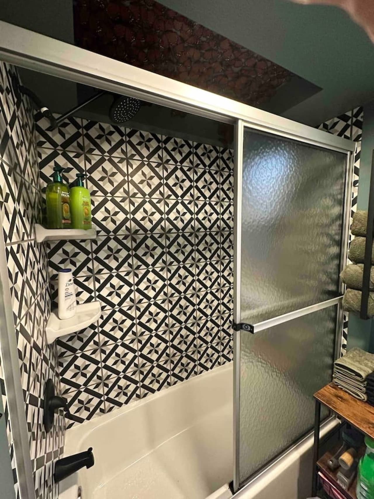 The bathroom’s got everything you need—tub, shower, towels, and toiletries—so you can wash off the day’s adventures and come out smelling less “hiking trail” and more “mountain spa.”