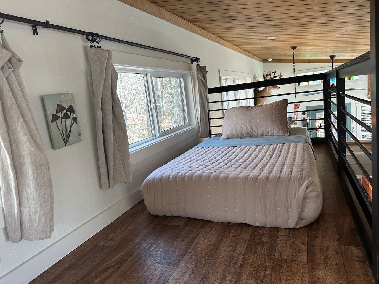 One side of the loft—home to a single twin bed, a great view, and just enough space to declare it your “private suite” away from the rest of the crew.