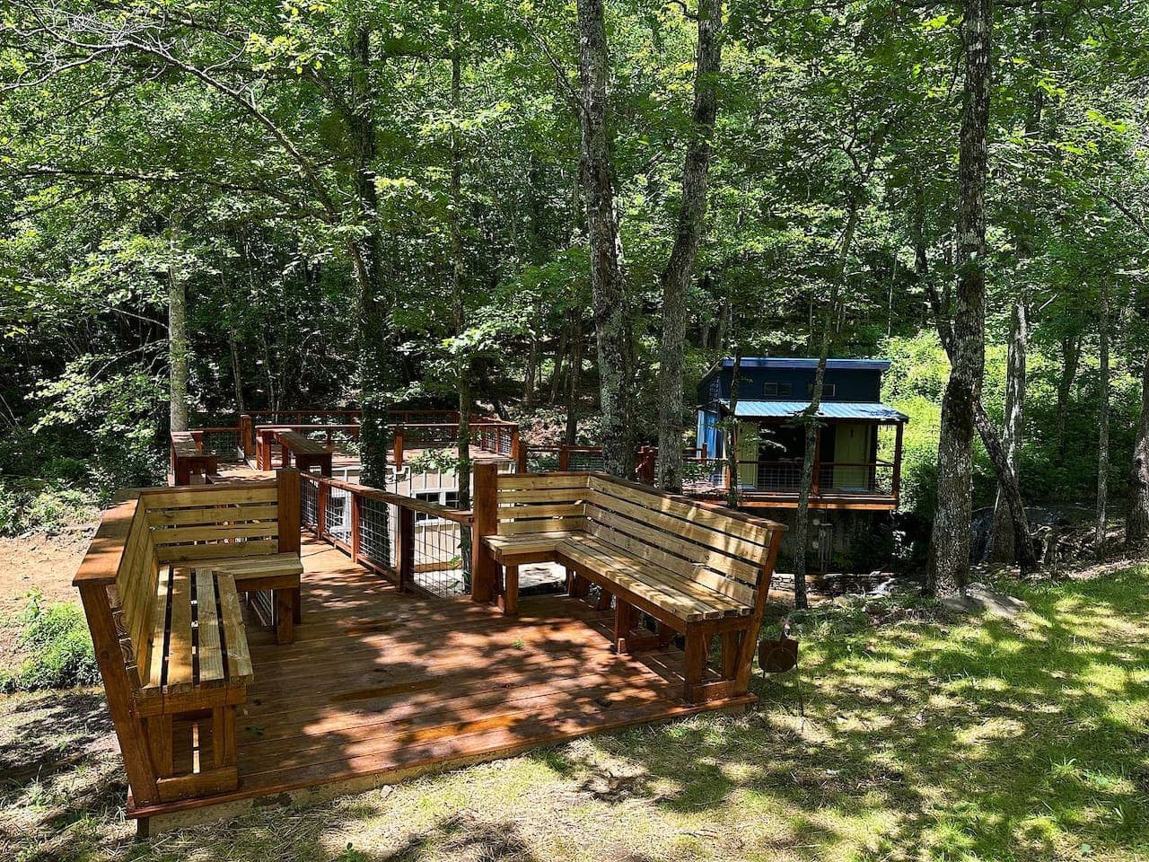 Path to the bathhouse (Includes an additional shower, toilet, and sink on each side available for guest use during their stay.).