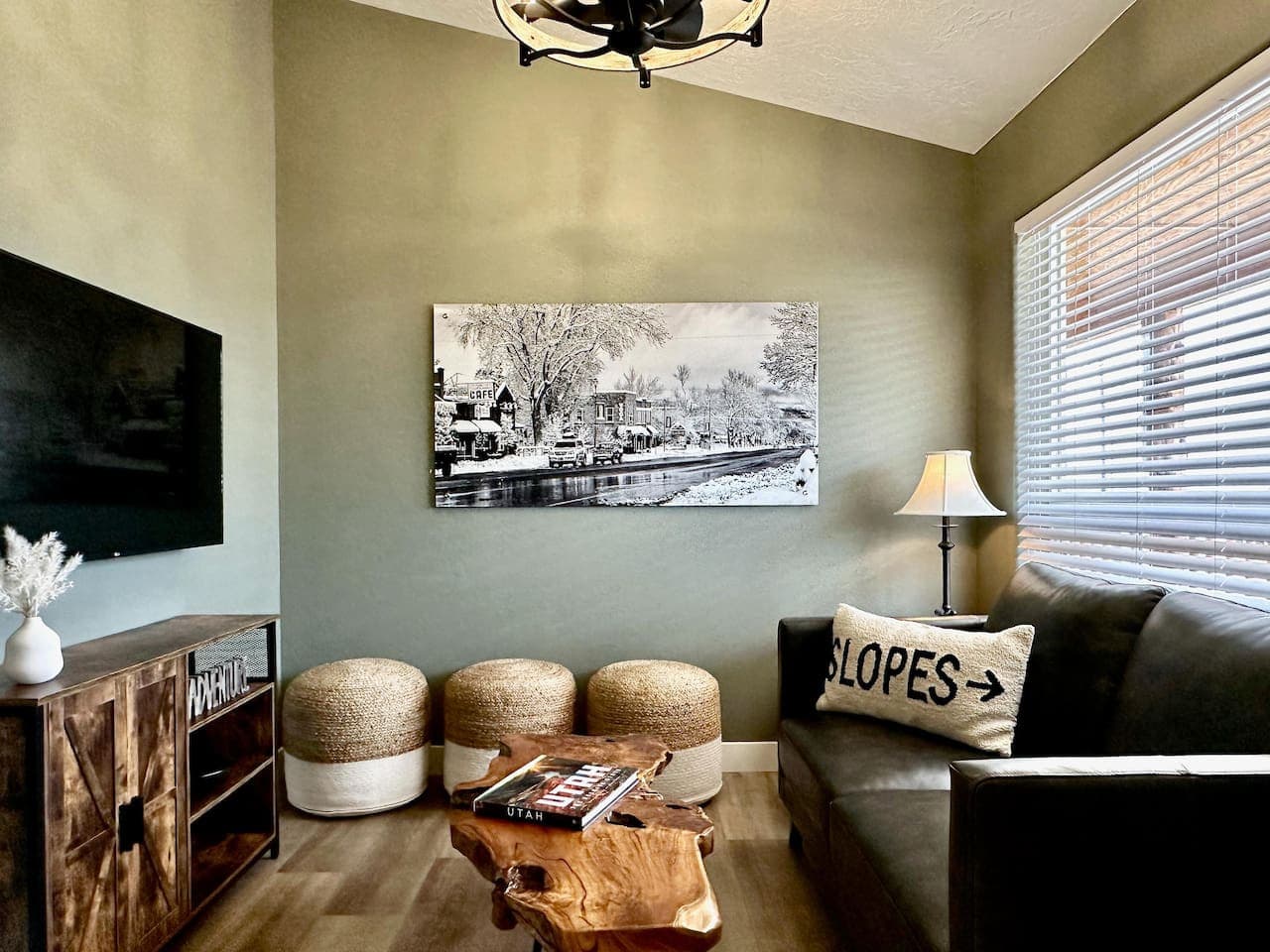 Sink into our couch in the well-lit TV room, bathed in natural light; it's the perfect spot for lazy mornings or cozy movie nights.