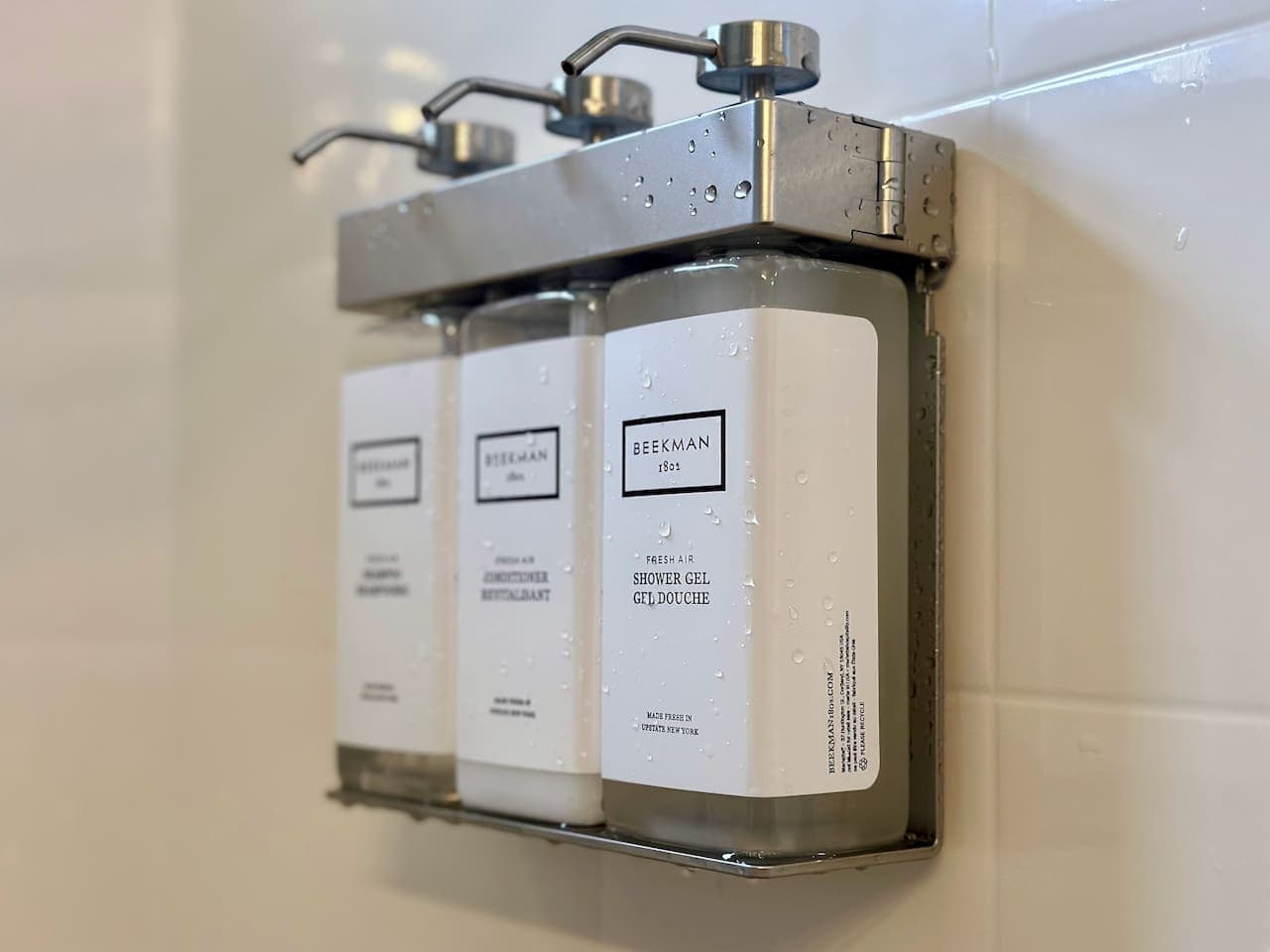 Luxury at your fingertips with our convenient, eco-friendly shampoo, conditioner, and shower gel dispenser.