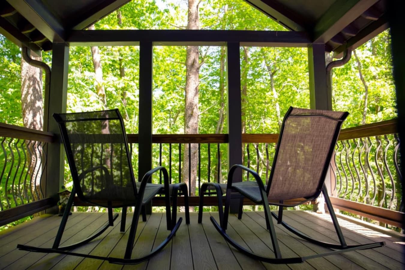 Relax on the front covered porch, where you can enjoy stunning river views and the calming sounds of nature, making it the perfect spot to unwind.
