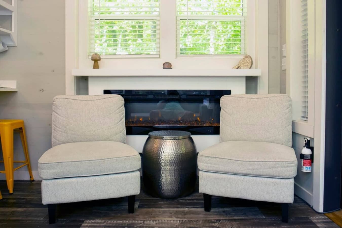 Relax and unwind in comfort by the fireplace, designed to create the perfect cozy atmosphere for your stay.
