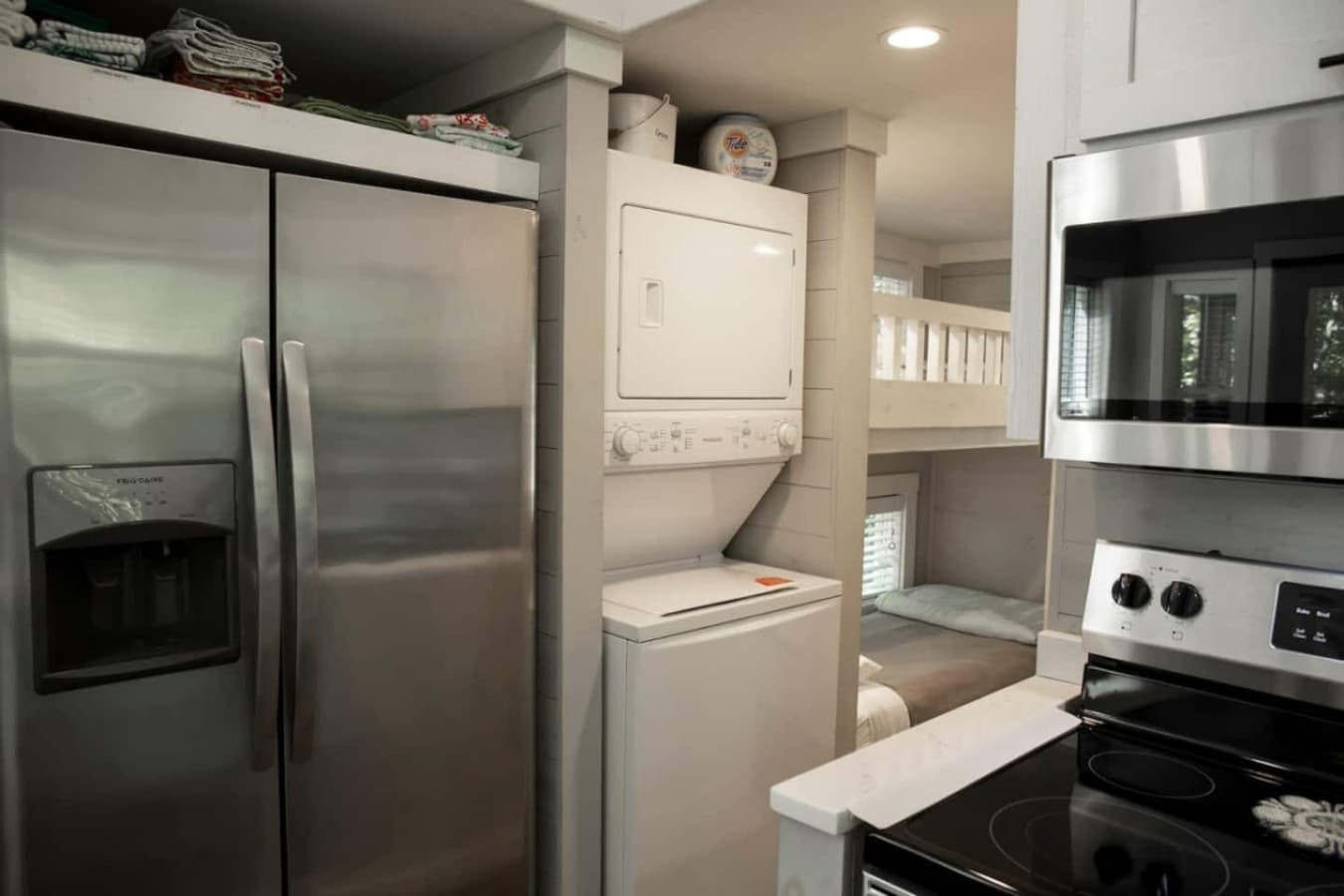 Conveniently equipped with a washer and dryer.