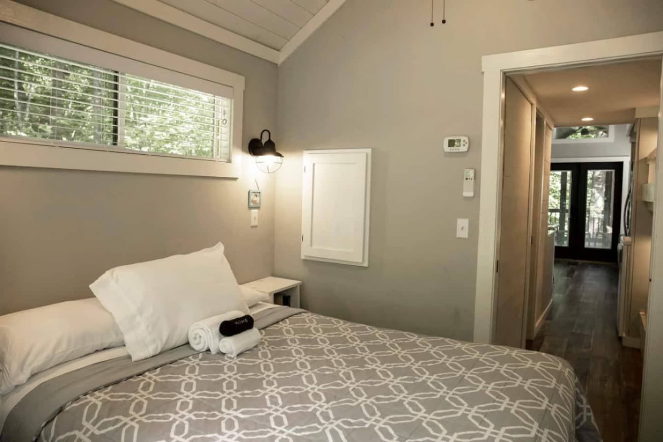 Rise and shine in the master bedroom with a comfy queen-size bed.