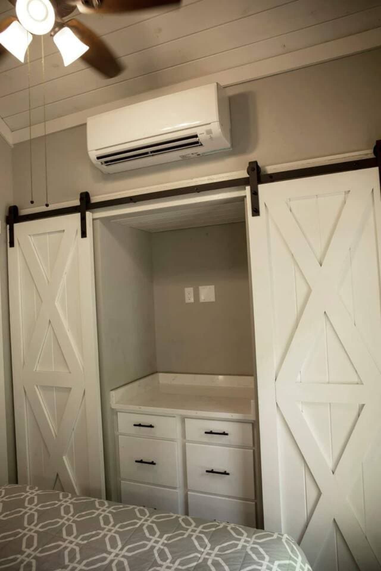 The master bedroom boasts double closets, offering plenty of room to store your belongings and keep everything organized during your stay.