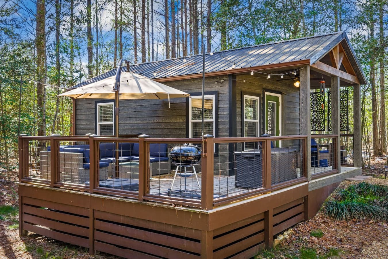 Gather on the patio for outdoor meals and laid-back moments, complete with seating and a ready-to-use grill.