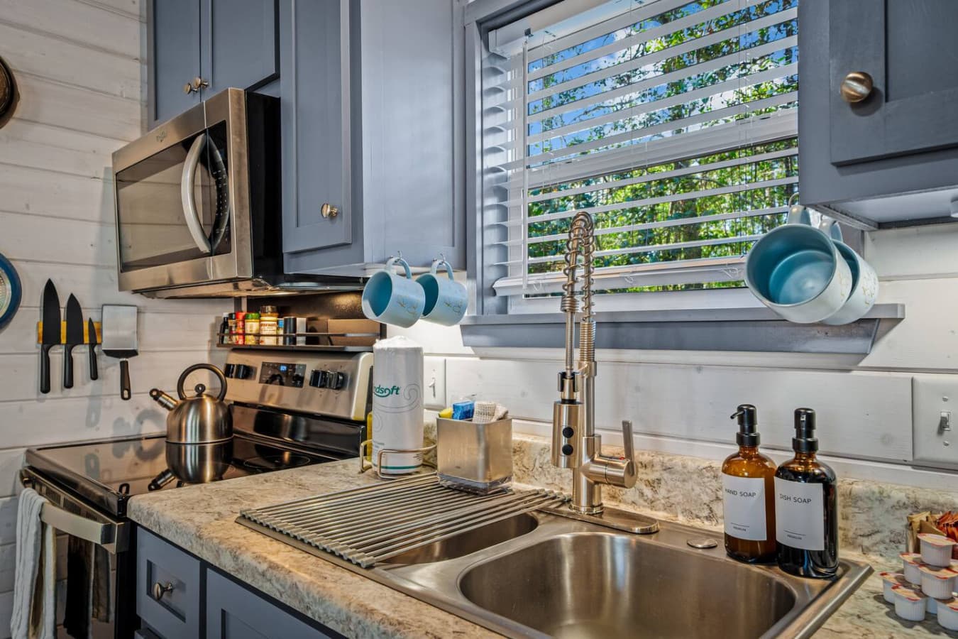 Stainless steel appliances and provided essentials make everything from quick breakfasts to cozy dinners effortless.