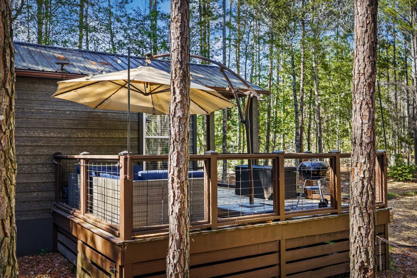 Enjoy the spacious patio with comfortable outdoor seating and a grill—perfect for relaxing and dining al fresco.