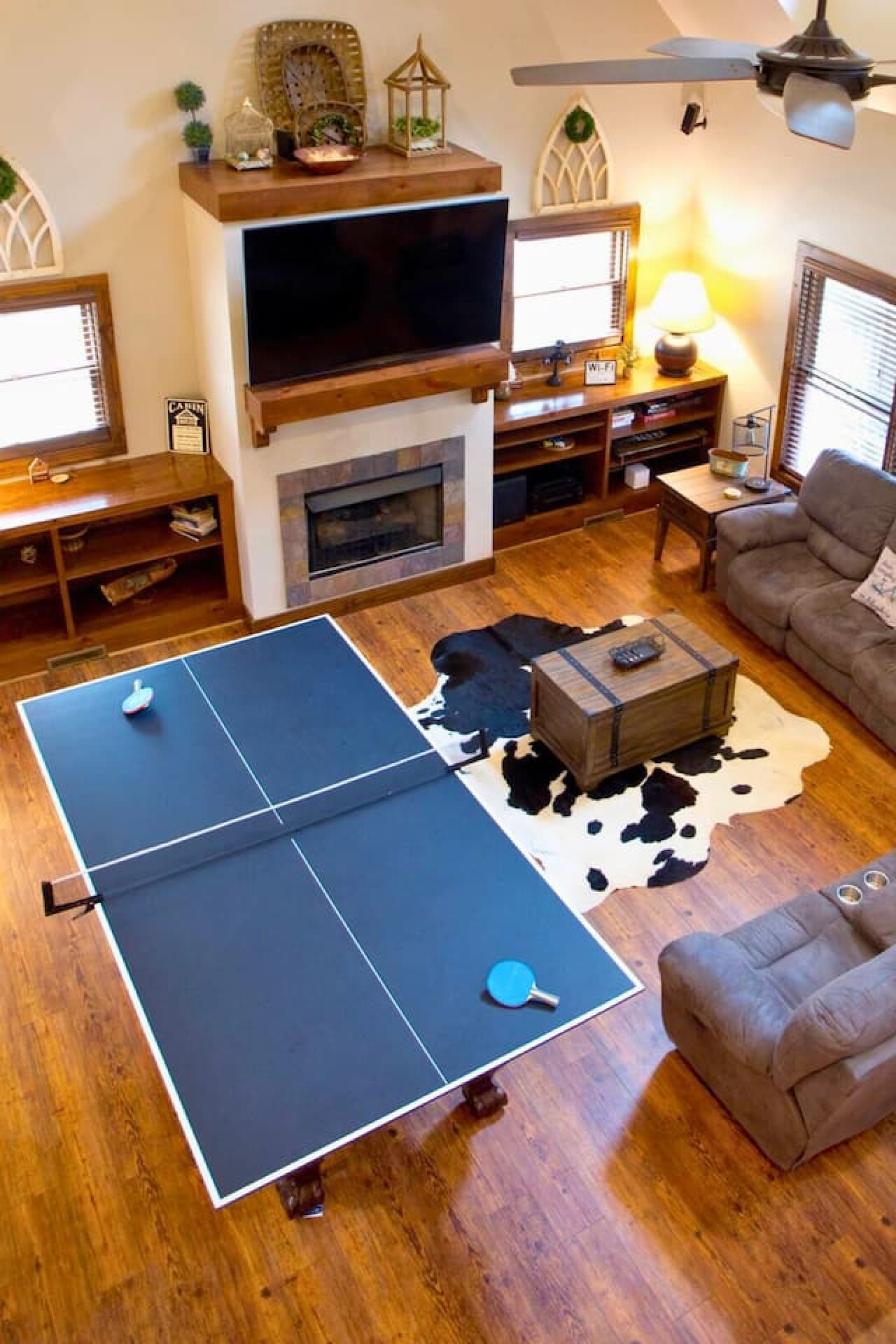 Relax on the sofas by the gas fireplace and enjoy a game of pool or convert the pool table to a ping pong table, or watch your favorite shows on the smart TV.