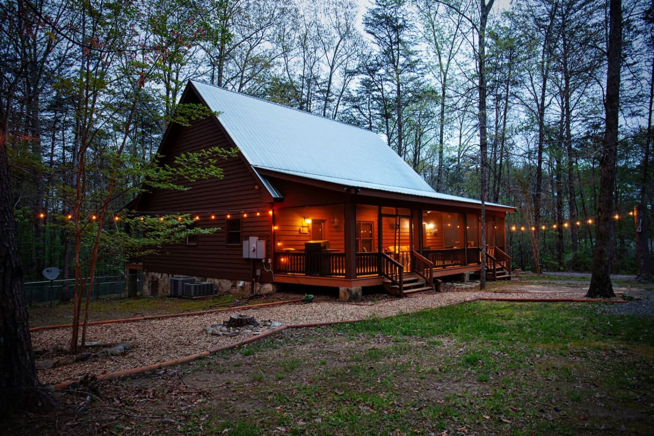 Relax on the large covered porch, overlooking the spacious, fenced-in front yard—ideal for enjoying the outdoors in privacy and comfort.