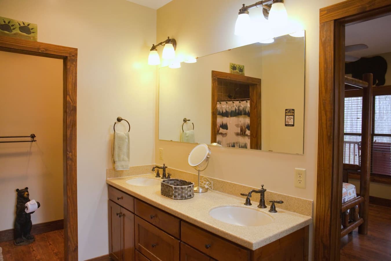 The master bathroom features a tile shower with a double shower head, a bench, and a double vanity. A toilet closet offers privacy, and the bathroom also includes a walk-in closet for added convenience.