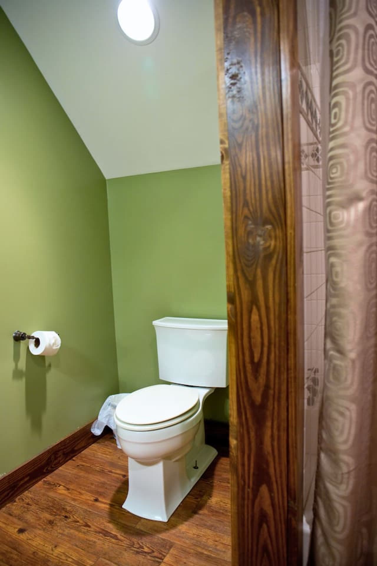 Bathroom 2 upstairs features a tub/shower combo, along with towels and washcloths for your convenience.