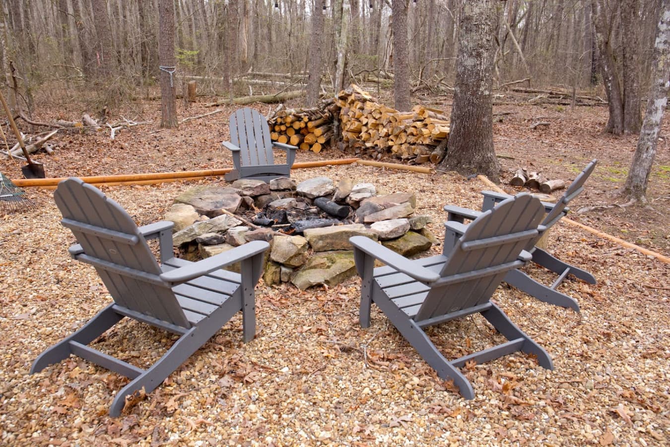 Enjoy the warmth of the fire pit with plenty of wood provided for your cozy evenings.