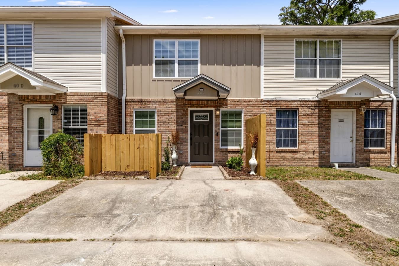 This charming townhouse offers two parking spaces right at the front, making it easy to come and go.