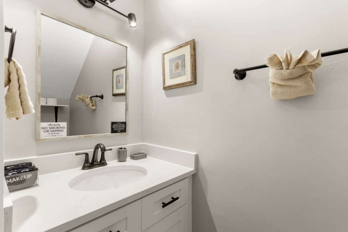 Small but mighty—this half bath’s got everything you need for a quick pit stop.