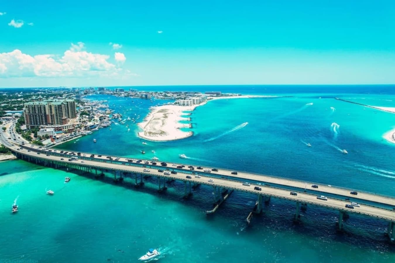 Step into paradise with Emerald Coast's vibrant blue waters – a true escape awaits!