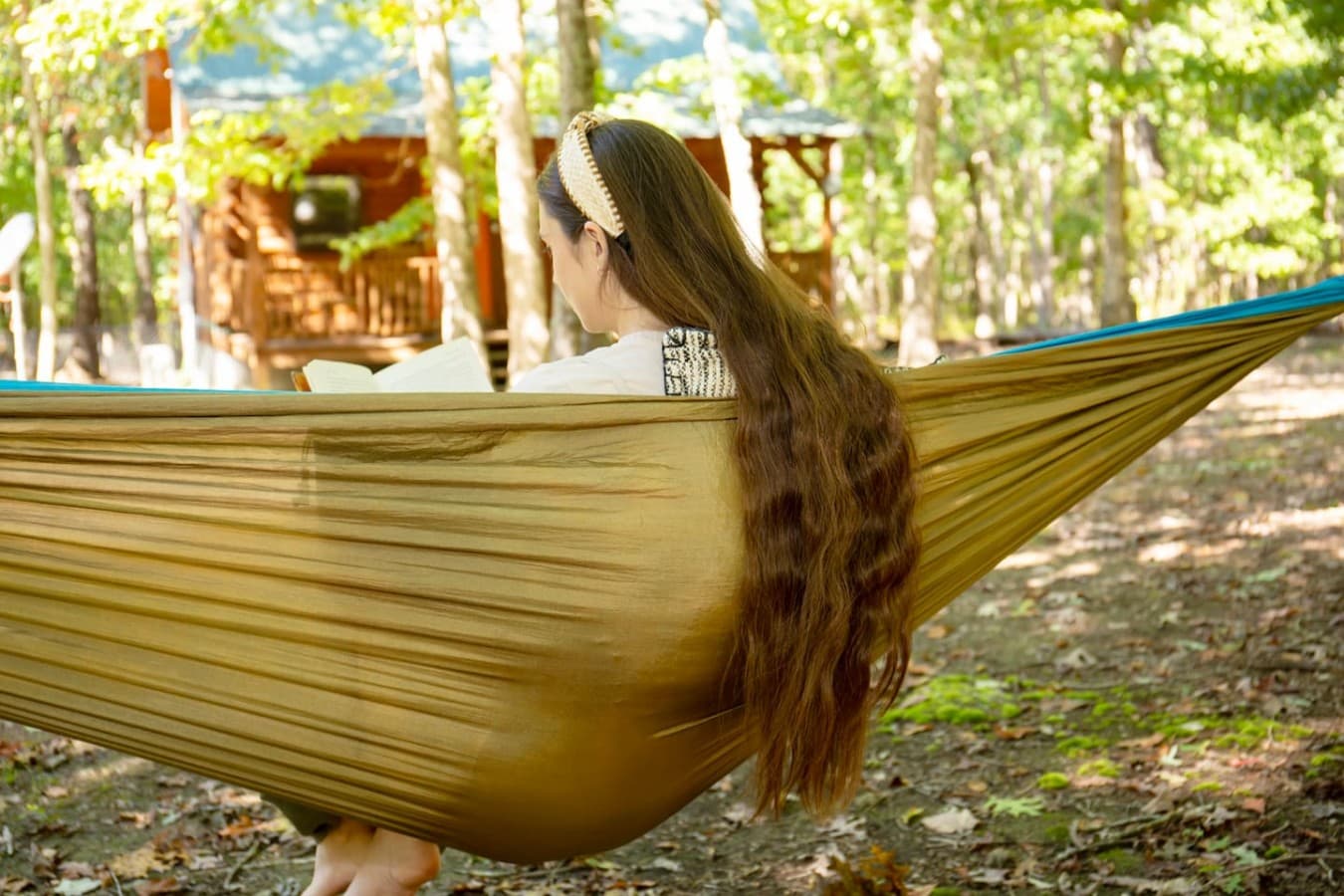 Bring a hammock and pick a new book from the book shelf.