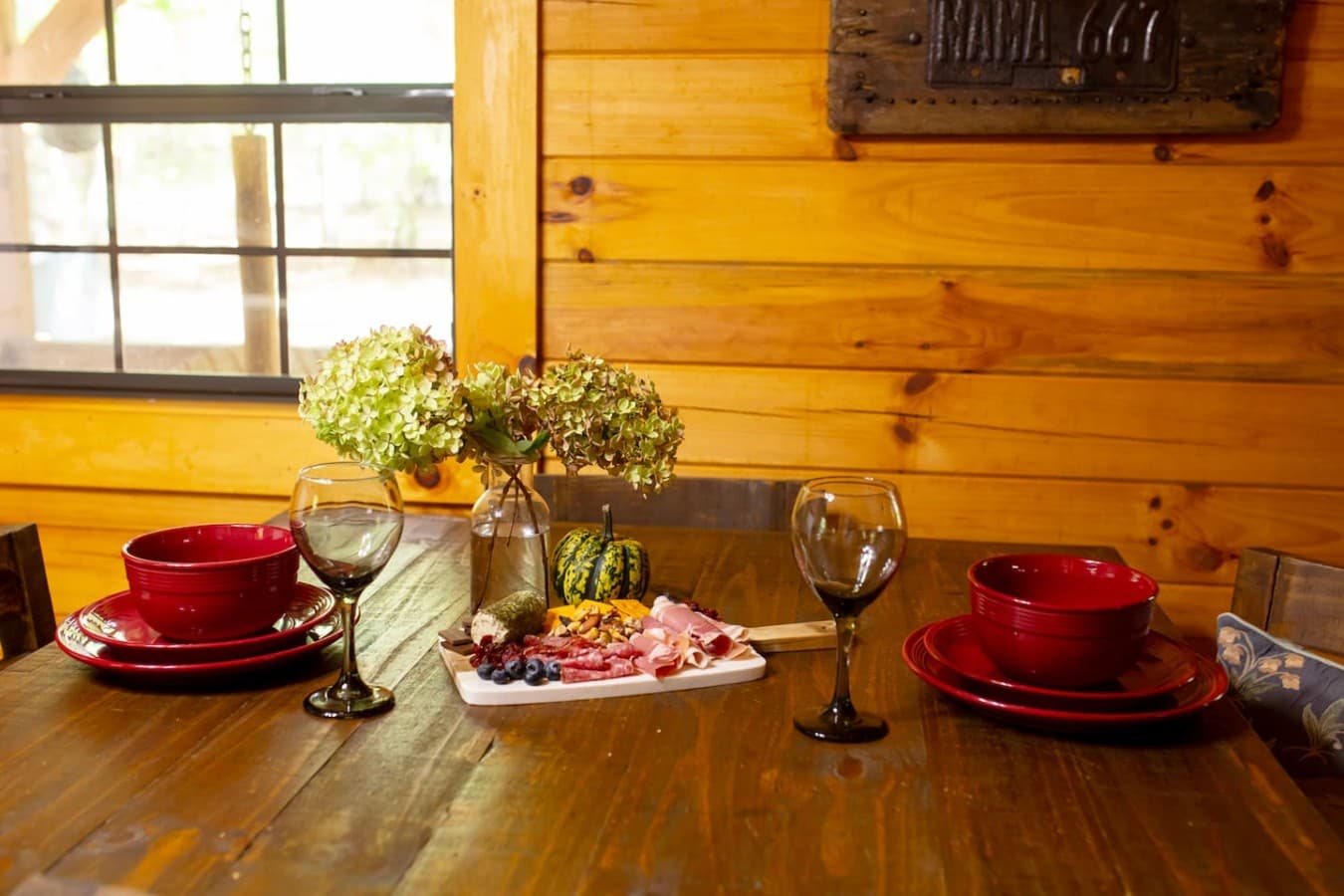 Dining table that seats 4, perfect for meals or laptop-friendly work.