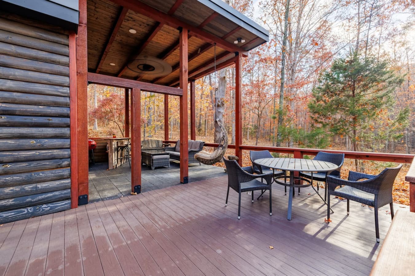 Relax in style with outdoor furniture on the wrap-around porch, perfect for enjoying the fresh air.